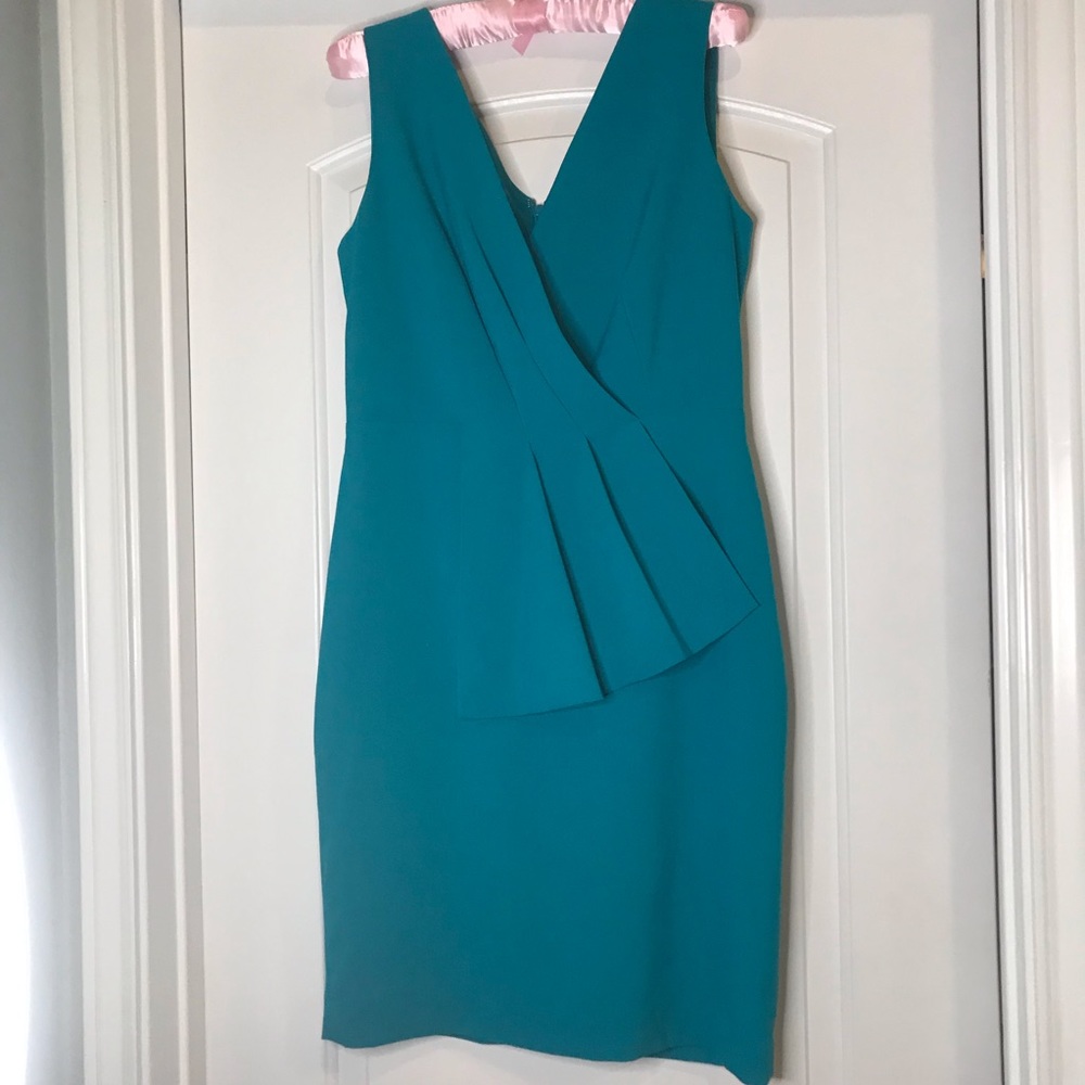 Teal fitted dress with front embellishment